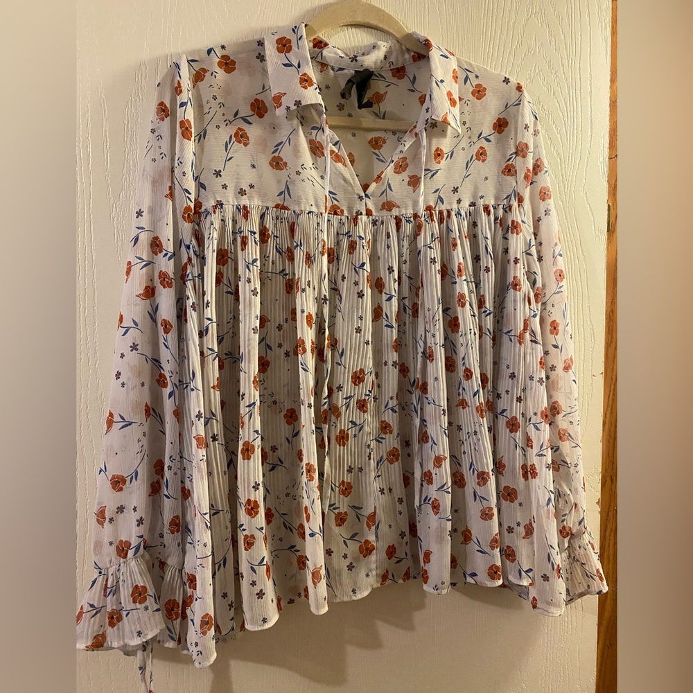white blouse with flowers